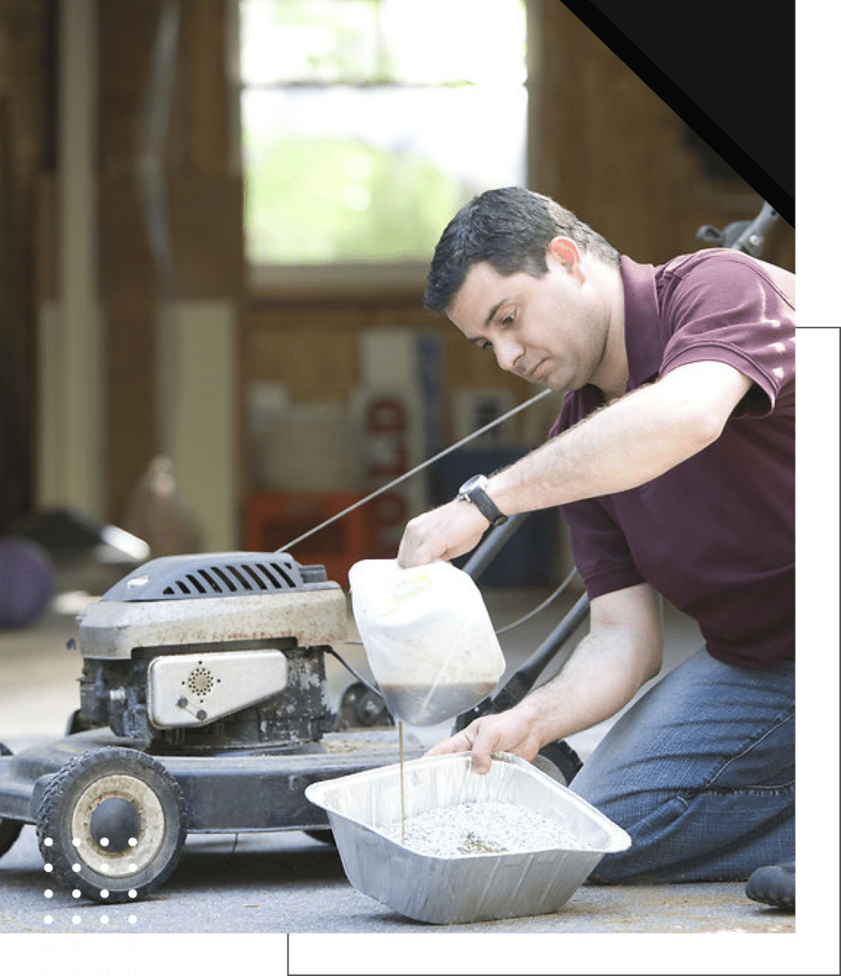 A man is pouring water into a bowl.